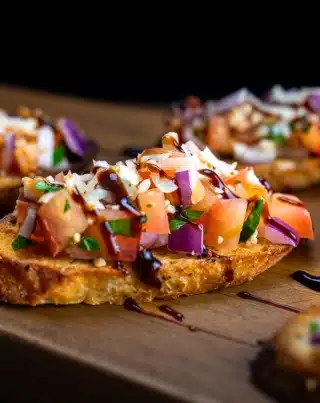 Bruschetta with tomato, onion, herbs, cheese, and balsamic glaze served at Silverwood’s Golf & Lounge.